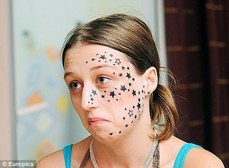 A teenage girl who claimed 56 stars were tattooed on her face as she slept 