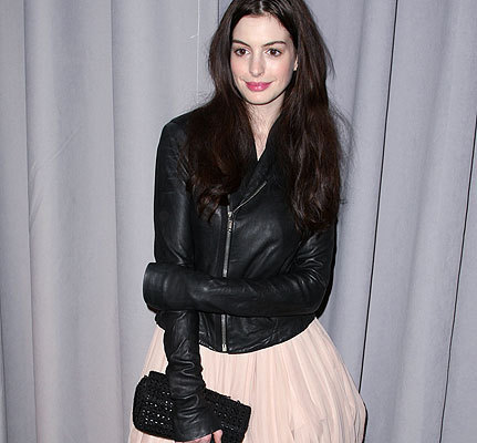 nothing says “boner” quite like anne hathaway in a pink dress and a leather 