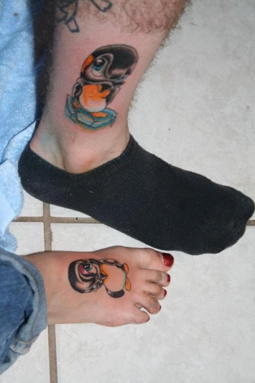 My and my boyfriends love penguin tattoos. :)