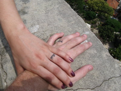 my wife and i both have hebrew tattoos on our fingers instead of wedding
