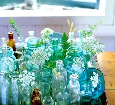A medley of blue and green vintage vases and bowls classic bride More