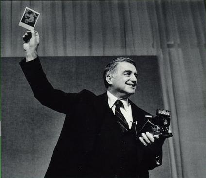 Edwin Land and the SX-70 (holding a Sonar Autofocus). Land holds the most 