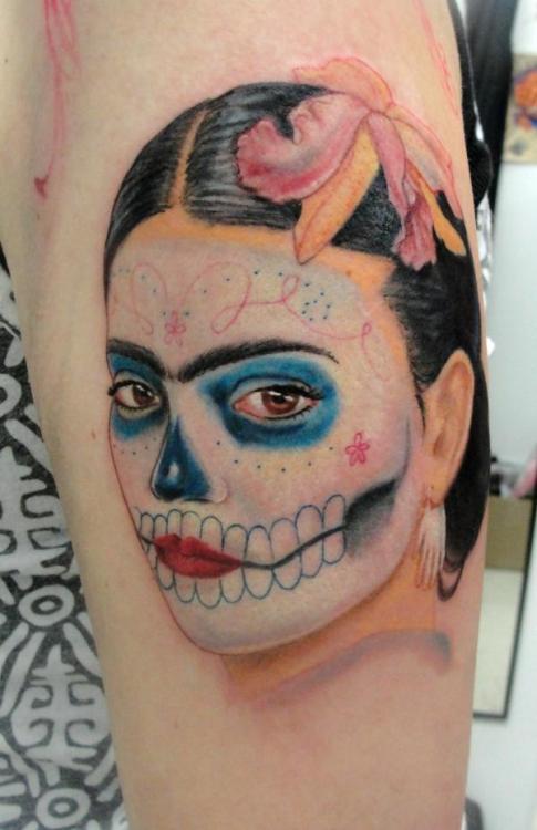 A portrait of Frida Kahlo done up as a sugar skull She 8217