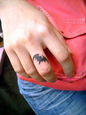tattoo on finger. tattoo on finger.