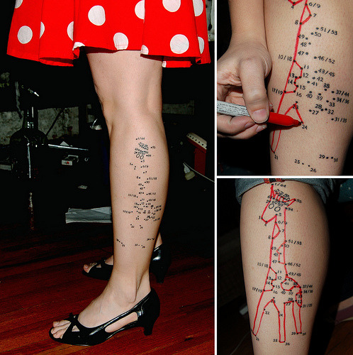 I love her circle skirt and lovely shoes not to mention the Best Tattoo In
