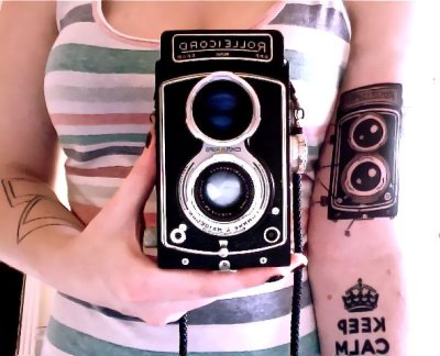 I&#8217;m a photographer and I got my first film camera tattooed on me