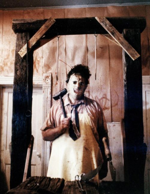  Leatherface — Two men would come to be known as the chainsaw-wielding Leatherface. The first was Bubba Sawyer, a mentally-retarded man under the control of his twisted family. Raised by a group of deranged cannibals, Bubba did the Sawyers’ dirty work in killing the people who would eventually become his family’s chili. Bubba had no true personality, only acting through the different personas of his masks made from human faces. As such, Bubba was different from most other serial killers in that he killed primarily out of fear, or out of his family’s orders. The second man to wear the many masks of Leatherface was Thomas Hewitt. Hewitt was often bullied as a child due to his muteness, mental retardation, and the facial disfigurement he suffered as a result of a flesh-eating disease. He was eventually diagnosed with mental degeneration at the young age of twelve. Hewitt eventually tried to live a normal life, finding work in the very meat factory he was born in. Unfortunately, health inspectors order the factory to shut down, and Hewitt’s boss and co-worker urge him to leave. Hewitt’s refusal to follow orders leads the two to call him a “dumb animal” and a “retard”. The insults trigger Hewitt’s memory of the cruelty he suffered in his childhood, and the years of abuse cause him to finally snap. He grabs a sledgehammer and bludgeons the two to death. As he goes around the factory, he chances upon a chainsaw, which would eventually become his weapon of choice. The murder is then discovered by local sheriff Winston Hoyt, who tries to stop Hewitt. Hewitt is saved, however, by his uncle, Charlie Hewitt, who kills Hoyt and assumes his identity. The abusive Charlie takes advantage of Hewitt’s mental retardation and manipulates him into doing his twisted work. Hewitt becomes the family’s most prominent murderer, supplying them with the human flesh needed to supply their meat shop. Hewitt, sick of the ridicule he’s received because of his hideous appearance, eventually makes a mask by slicing off the face of one of his victims, creating Leatherface as we know and fear him.