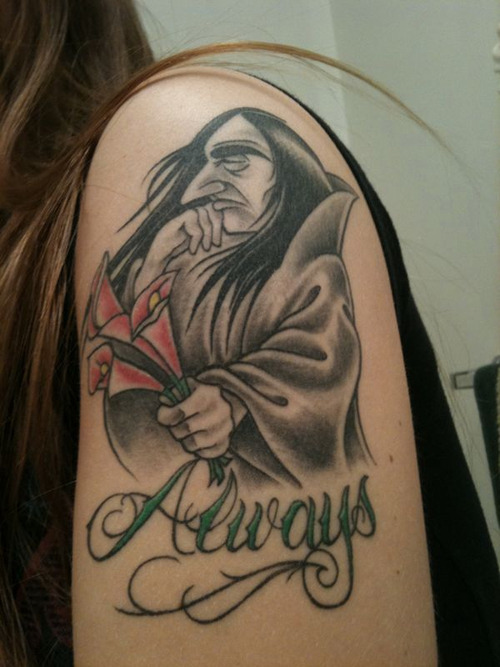 This is my Snape tattoo I've been reading Harry Potter for over half my 