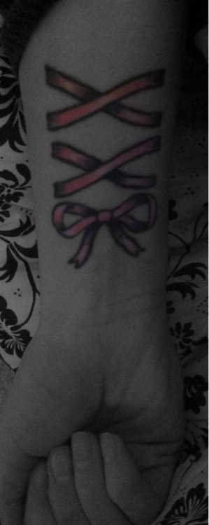 tattoo bows. ribbon ow tattoo.