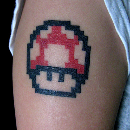Tattoo from a great fan of super mario done by me on El Cuervo Studio