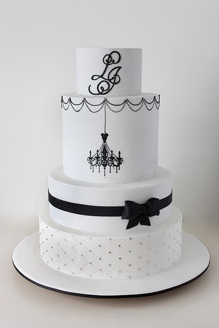 Black and White wedding cake with a chic black chandelier quilting 