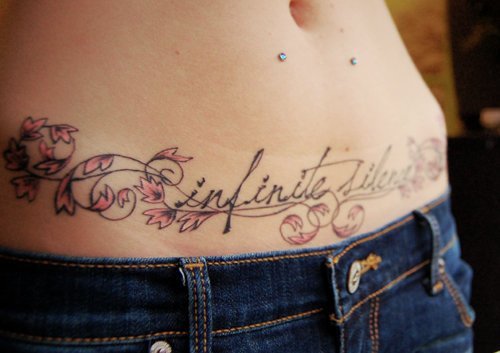  infinite dermal piercing stomach leaves pretty cursive tattoo 
