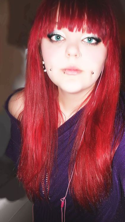 red hair and lip piercing. dimple piercings, red hair