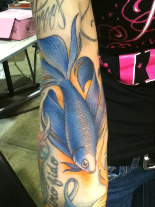 kissing fish tattoo. 2010 tattoo arm warmers, betta fish tattoo. Erin got this Betta fish from
