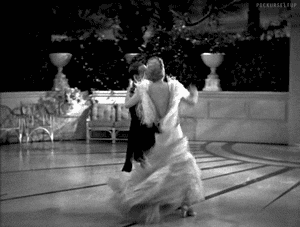 Fred Astaire and Ginger Rogers in Top Hat (1935). This moment in &#8220;Dancing Cheek to Cheek&#8221; is Fred and Ginger at their most exquisite. Really. After all these years, this number still makes me gasp. And that dress! 
-via pickurselfup
