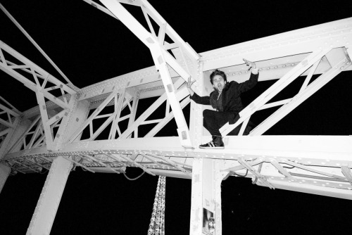 Jared climbing on top of the bridge.