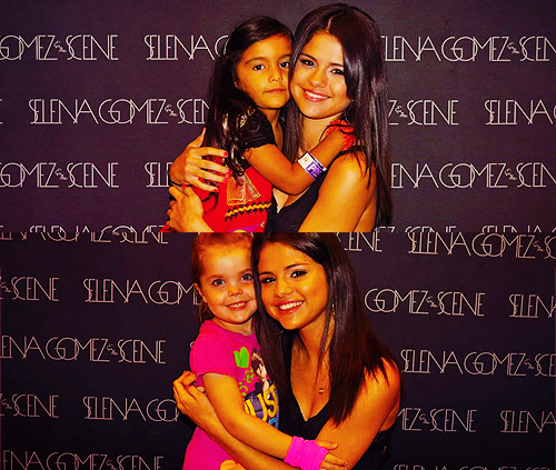 selena-world:   look at the second photo. girl wearing a T-shirt with Justin Bieber aw  so cute! 