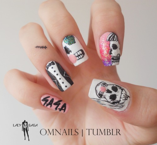 omnails:

Lady GaGa nail art (Halloween) | I would paint only skulls, but I was looking for inspiration on fylg and tought why not to paint one more Lady GaGa (Born This Way) nail art? It’s awesome for halloween and also to show that I’m a liltte monster and I’m really proud of it! Happy GAGAWEEN!!!
Other Gaga nail arts I did:
Yoü and I  | Judas | The Edge Of Glory 
