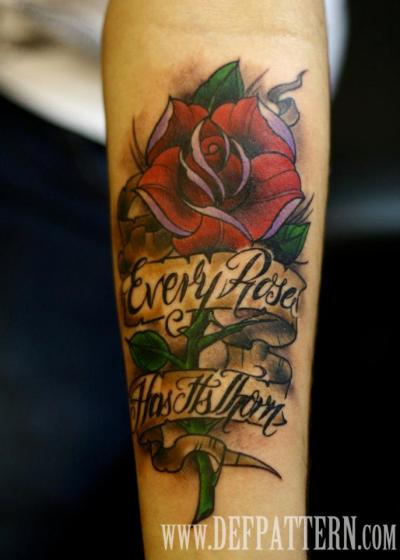 The tattoo says Every Rose Has Its Thorn The tattoo itself is a metaphor