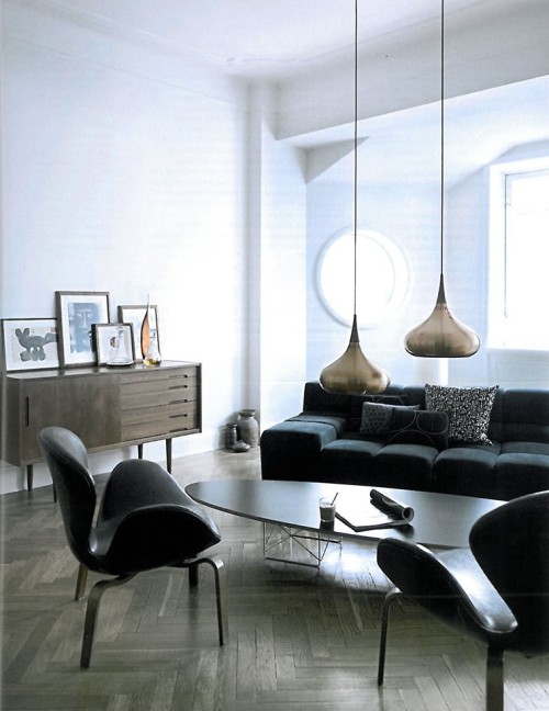 Low-hanging ceiling lights have never looked so cool - this Stockholm living room is a dream.  source.