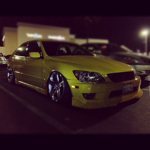 Slammed lexus is300 at a bowling alley parking lot sitting on Rotiform 