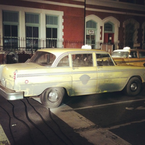 1960s cars and cabs have descended on the East Village for the Coen Brothers