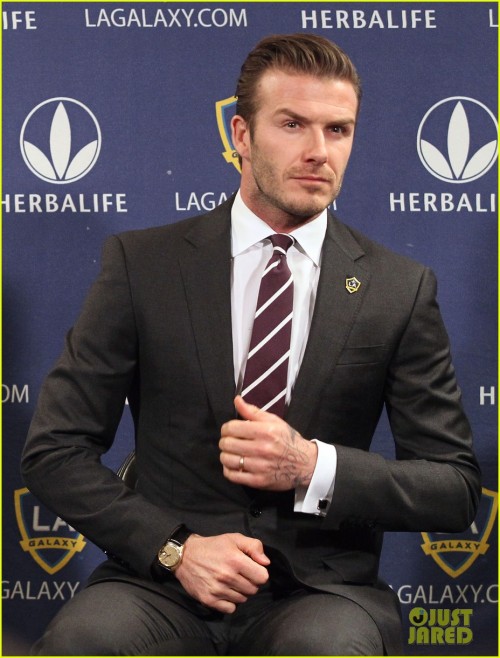 David Beckham suits up for a press conference announcing his new contract with the L.A. Galaxy on Thursday (January 19) at Staples Center in Los Angeles.
