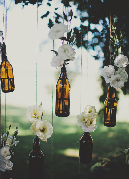 Do it yourself decor at weddings is so unique and pretty Use empty wine and