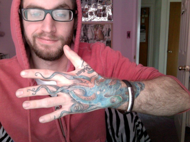 This was my third tattoo Octopus on the hand The finger were not fun and
